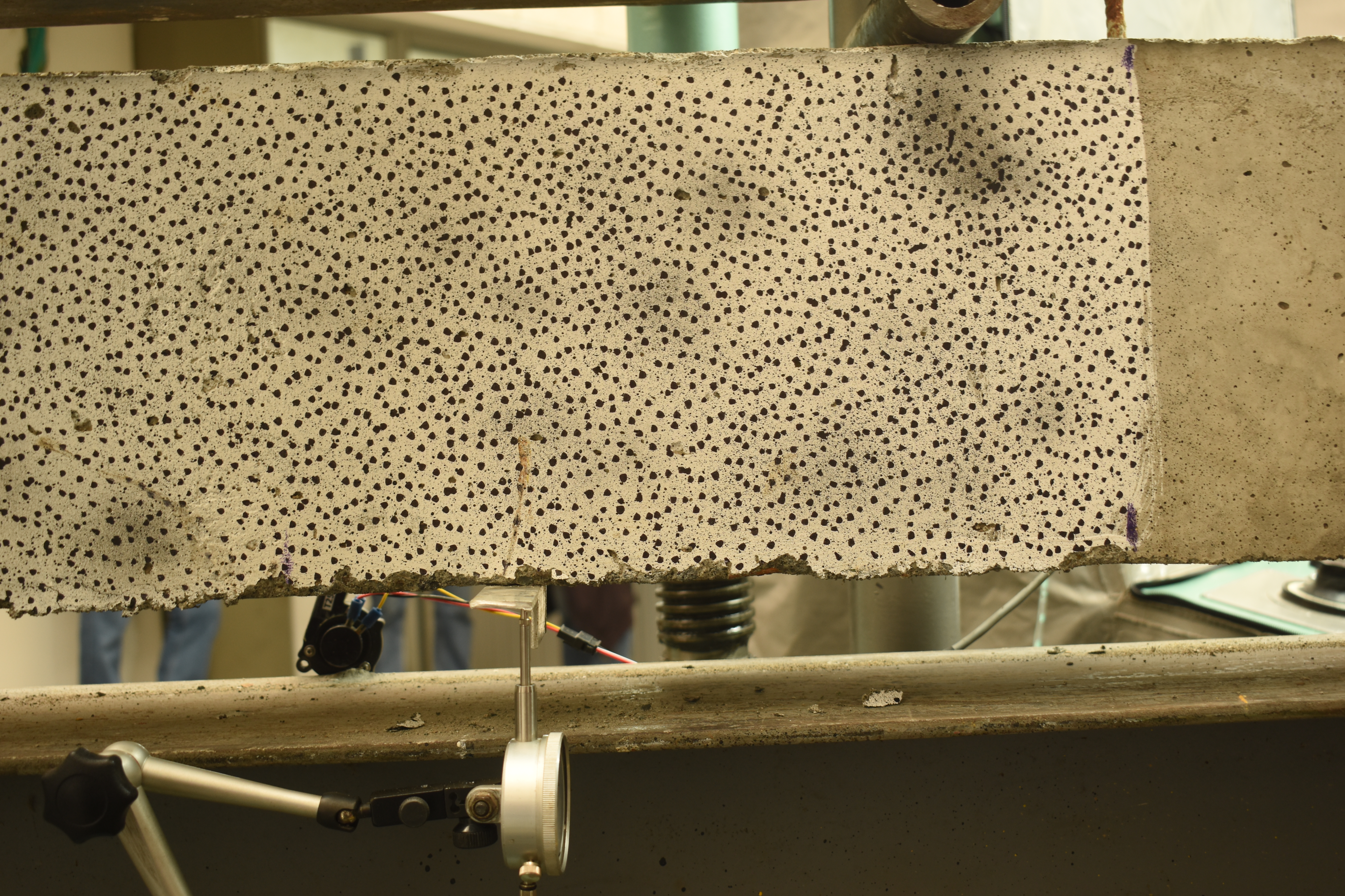 Concrete beam with speckle pattern