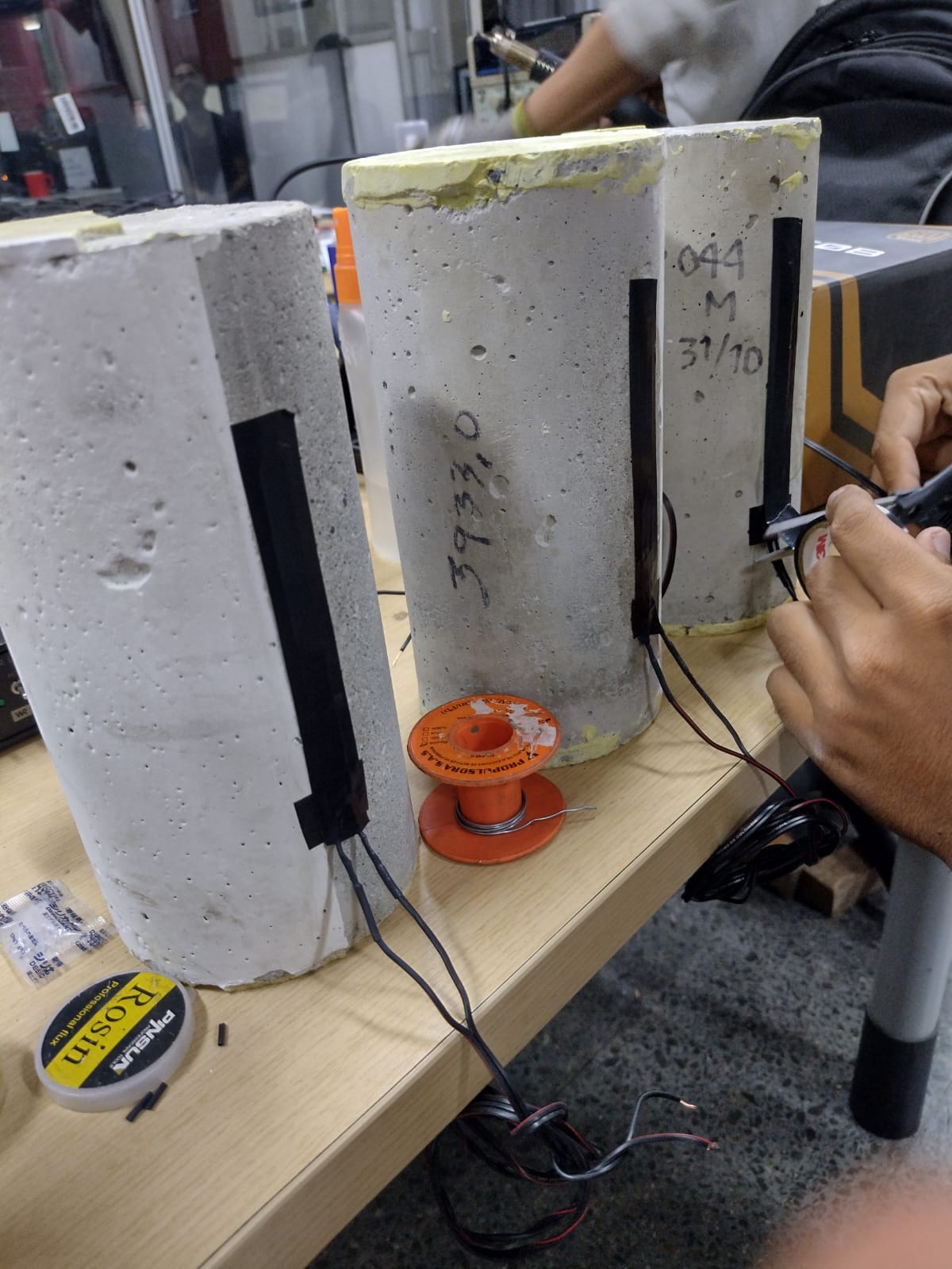 Concrete cylinders with strain gauges installed